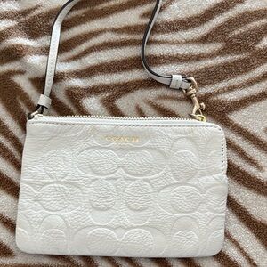 Coach Light Pink Embossed Wristlet